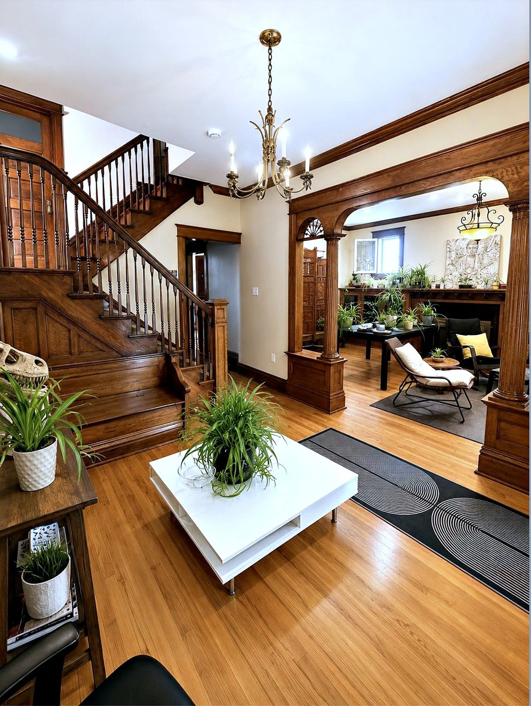 Entry — historic staircase and gallery wall